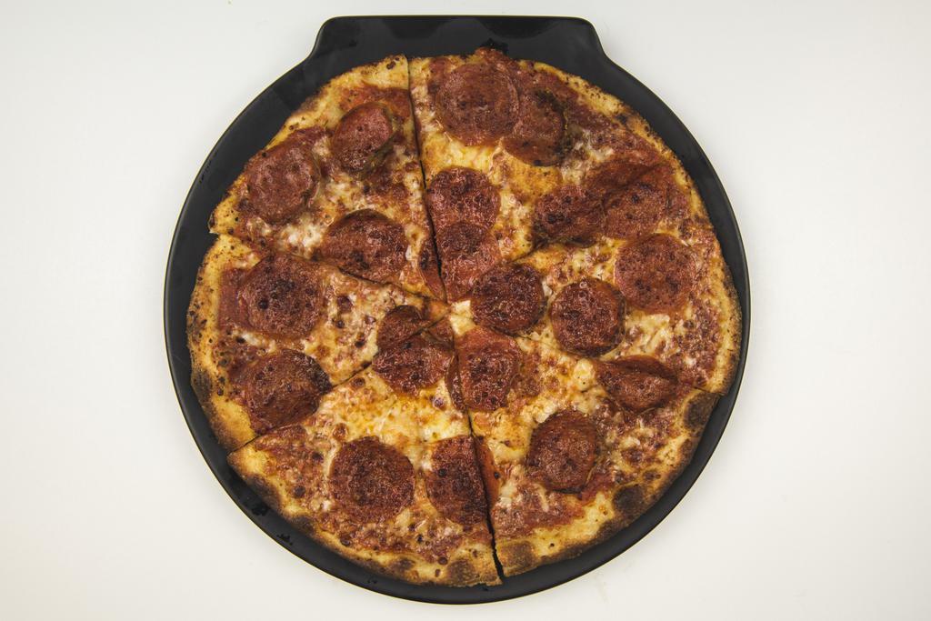Pepperoni Pizza · Tasty slices of pepperoni on top of marinara, mozzarella, parmesan, and pecorino romano.