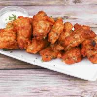 10 Pieces Mild Wings · Cooked wing of a chicken coated in sauce or seasoning.