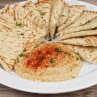 Hummus with Pita Bread · Dip made from chickpeas.