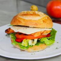Homemade Panini · Grilled or fried chicken with lettuce, tomato, roasted peppers, mozzarella and balsamic dres...