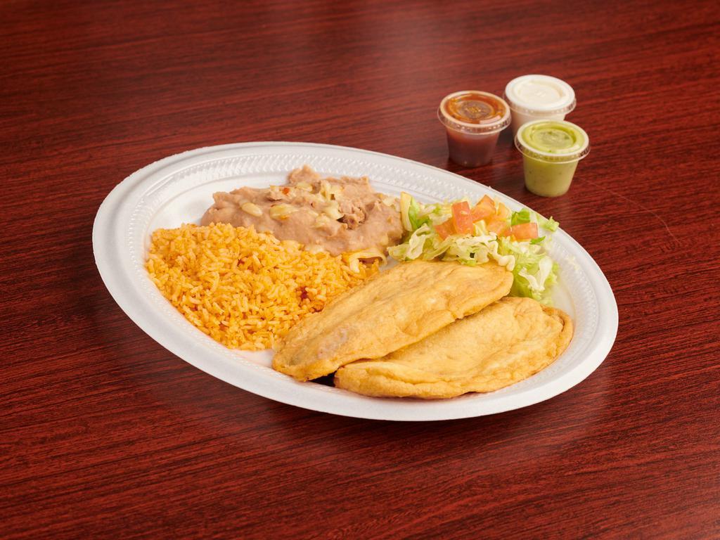 Chiles Rellenos · Two Chile Rellenos. Served with rice, beans, and your choice of corn or flour tortillas.