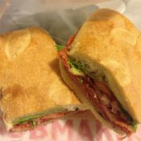 The Michael Corleone Sandwich · Salami, soppressata, lettuce, sun-dried tomatoes and provolone cheese.
Includes mayonnaise a...