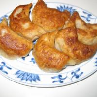 A4. Pot Sticker · 6 pieces. Pan fried or steamed dumplings with ground pork and vegetable filling.