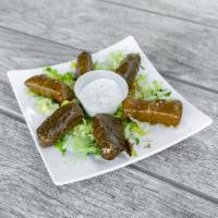 Grape Leaves · 6 pieces. Vine leaves rolled with a mix of rice, chopped tomatoes, parsley, mint, and onions...