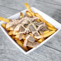 Patras Messy Fries · Crispy fries topped with fresh oregano, loaded with your choice of meat - chicken or lamb, s...