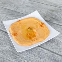 Spicy Hummus · A marriage of our hummus and red sauce. Vegetarian, vegan, and gluten-free. 