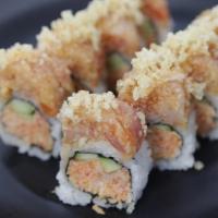 13. Mr. Fish Roll · Mix of tuna, salmon, tilapia, spicy crab meat, cucumber and crunch, eel sauce (8pcs)