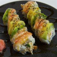 24. G-Dragon Roll · Rice, shrimp ebi, crabmeat, cucumber, avocado and shrimp tempura. (10 pcs)