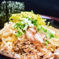 33. Shrimp donburi · A bowl of rice topped with shrimp, onion, egg simmered with donburi sauce. Served with pickl...
