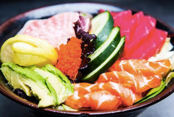 42. Chirashi · Salmon, Tuna, white fish over sushi rice, cucumber, seaweed salad, lemon, ponzu sauce