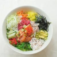 43. Raw Fish Salad Over Rice · Salmon, Tuna, White fish, Crab Meat, Avocado, Seaweed Salad, Lettuce, pickled radish, pickle...