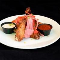 Chicken Wings Confit  · 6 pieces chicken wings in choice of seasoning served with house-made blue cheese dip and pic...