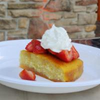 Homemade pound cake · Homemade pound cake served with local seasonal berries and whipped cream
