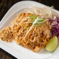 Pad Thai · Stir-fried thin noodles with tamarind sauce, bean sprouts, eggs, tofu, and topped with groun...