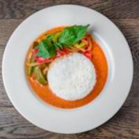 Red Chicken Curry · Consisting of red curry paste cooked in coconut milk with chicken, bell peppers, bamboo shoo...