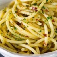 Spaghetti Olio Aglio · Spaghetti with fresh garlic and olive oil.
