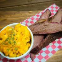 Sliced Brisket Platter · Our beef brisket, seasoned and smoked for hours for a deep smoky flavor and sliced thin. Com...