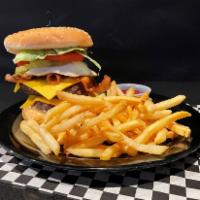 Touchdown's Burger · 2 house hamburger patties stacked high with fried egg bacon, American cheese and special sau...