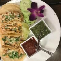 Chicken tacos  · Corn tortilla,Chicken, onion , solantro and our sauces on the side