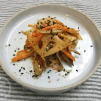 Kinpira · Sauteed burdock root, carrot and lotus root. ichimi pepper