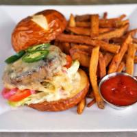 The John Doe Burger · Pretzel roll, pickled red onion, lettuce, tomato and a roasted garlic aioli. Includes choice...