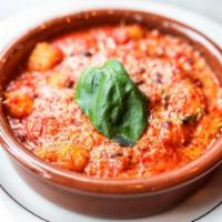 Gnocchi alla Sorrentina · Tomato sauce, mozzarella, basil, EVO oil.