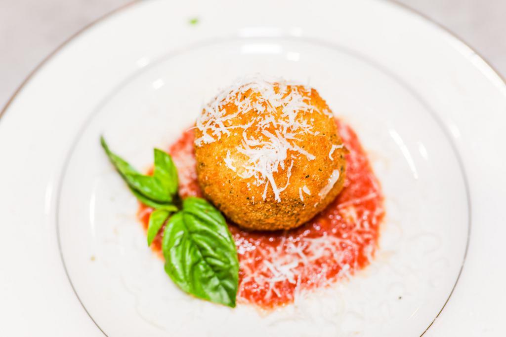 4 Cheese Arancini · Crispy deep fried Sicilian balls of rice filled by mozzarella, provolone cheese, Parmigiano Reggiano and fontina cheese.