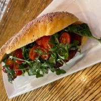 Chicken Cutlet Italian Hero · Served on seaded hero. Chicken cutlet, spicy Calabrian chili aioli, tomato, basil and arugula