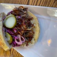 Pulled Pork BBQ on Roll · Pulled pork, slaw, pickled onions, pickles and BBQ sauce. 
No Cheese Recommended