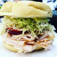 Brooklyn Combo Cold Cut · Smoked turkey, smoked ham, coleslaw, Swiss and Russian dressing.