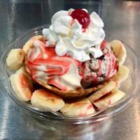 Banana Royal · any 3 flavors of ice cream in waffle bowl w/ diced banana, sauce topping, whipped cream, and...