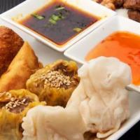 Asian Sampler · Chicken dumplings 2 pieces, beef dumplings 2 pieces, vegetables spring rolls 2 pieces, chick...