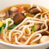 Udon Soup · Chicken or vegetable and udon noodles in a clear broth.