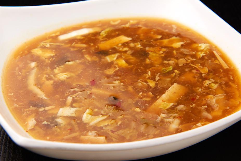 Hot and Sour Soup · Delicious combination of spices in a creamy soup.