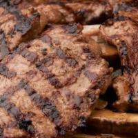 Portobello Steak · Argentinian top rib strips cut into fillets grilled over a high flame served with portobello...