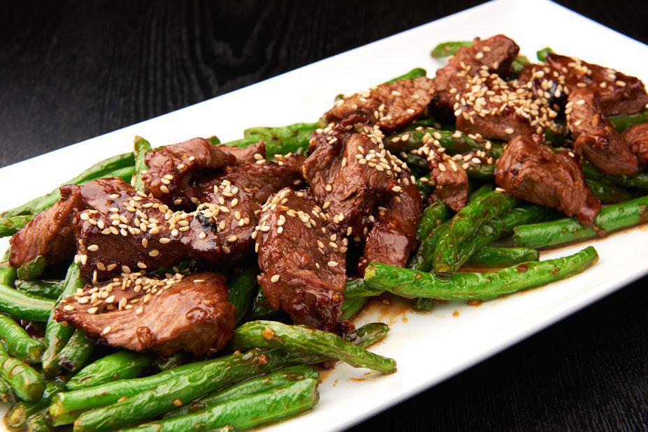 Thai Special Steak · Cubes of tenderest prime beef marinated in a Thai special hoisin sauce and grilled over a high flame served with string beans. 