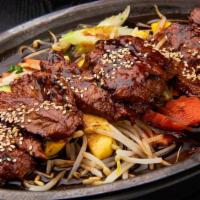 Beef Teriyaki · Filled of grilled tender beef marinated in teriyaki sauce served with carrots, bean sprouts ...