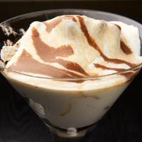 Tiramisu · Rich layered Italian specialty of whipped cream, white cake, espresso, and chooclate served ...