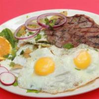 Chilaquiles with steak and egg · Green or red sauce