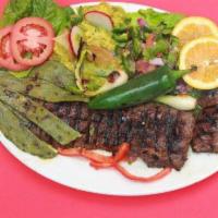 Steak with Nopales · Steak with nopales,guacamole,pico de gallo,jalapeño rice and beans