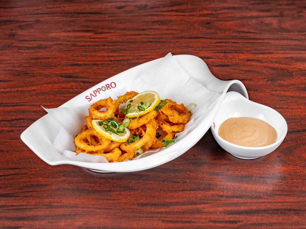 Seven Spicy Calamari · Fried calamari tossed in Japanese chili. Served with spicy mayo.