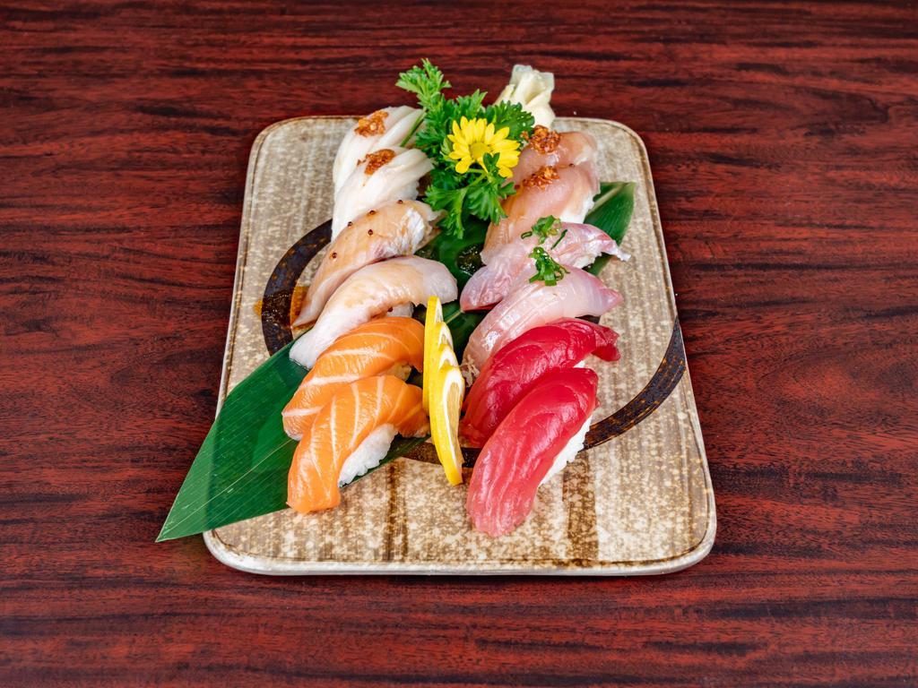 Sushi Combo A · 2 pieces tuna, 2 pieces salmon, 2 pieces red snapper, 1 pieces crab, 1 pieces eel, 1 California roll.