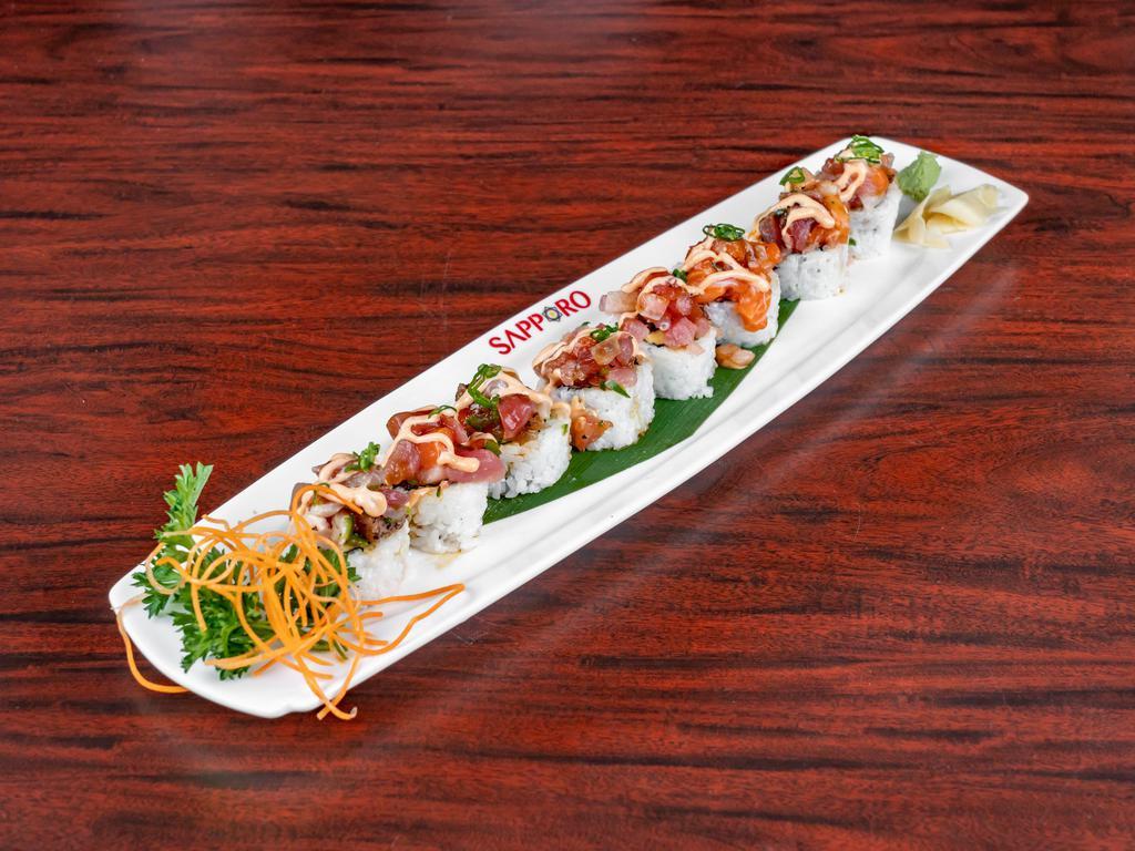 Sakura Roll · Spicy tuna, boiled shrimp, and avocado. Topped with mixed fresh fish and jalapeño, spicy mayo, eel sauce, and green onion.
