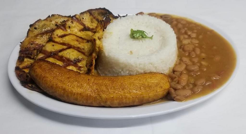 #12. Pechuga de Pollo a la Parrilla con Maduro · Servidos con arrow frijoles, maduro.  grilled chicken breast with rice, beans and sweet plantain.