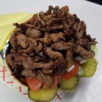 02. Beef Gyro بيف جايرو · Lettuce, tomato, onions, pickles. Choice of sauce.