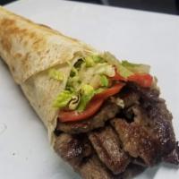 07. Lamb Wrap صاج لحم  · Lettuce, tomato, onions, pickles. Choice of sauce. Add feta cheese for an additional charge.