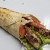 12. Shish Kabab Wrap -Chicken صاج كباب دجاج · Chicken, tomato, onions, pickles, parsley. Choice of sauce.