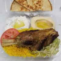21. Lamp Shank Plate طبق لحم غنم · Saffron rice, salad, hummus, tzatziki, pita bread. Choice of sauce.