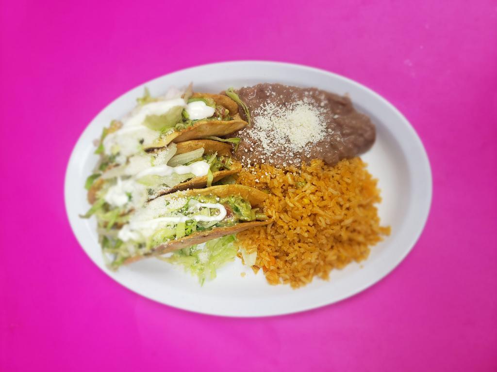 Guacamole taco · 3 hard shell guacamole taco, lettuce, cotija cheese, sour cream with rice and beans