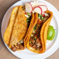 Birria Taco · (1) Braised Beef in Mexican stew. Made on double corn tortilla topped with cilantro and  oni...